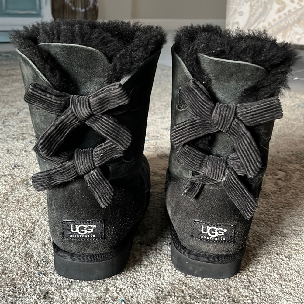 UGGS! Size 7 black with bows on the back.